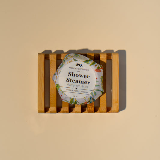 Shower steamer wrapped in Christmas theme wrapper